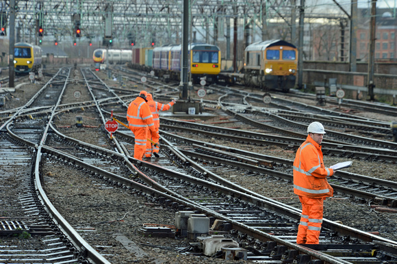 DG169923. Track workers. Manchester Piccadilly. 7.2.14.