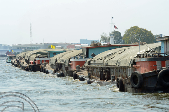 DG204782. Barges on the Chao Praya river. Bangkok. Thailand. 3.2.15