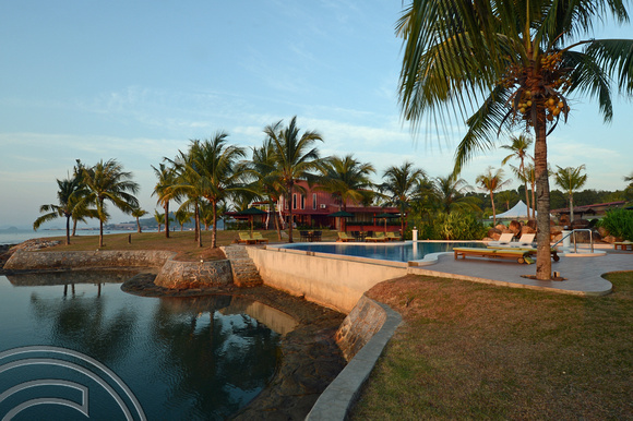 DG204549. Sunrise over the pool. Ocean Residence. Kuah. Langkawi. Malaysia. 20.1.15