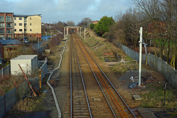 DG170814. The march of the electrification masts. Prescot. 15.2.14.