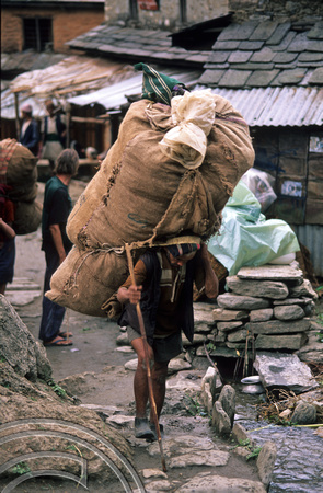 T7091. Porter. Gorkha. Nepal. 1998.