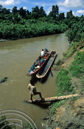 T3738. Going upriver. Siberut. Mentawai Islands. Indonesia. 1992.