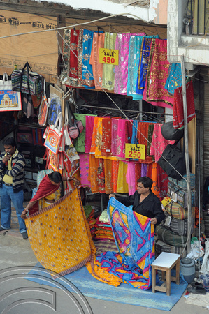 DG69524. Sari shopping. Paharganj. Delhi. India. 6.12.10.