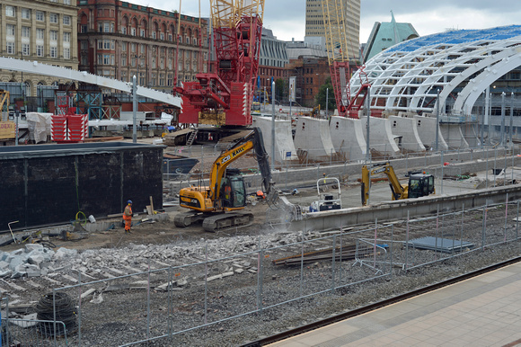 DG188244. Demolishing Metrolink platforms.  Manchester Victoria. 30.7.14.