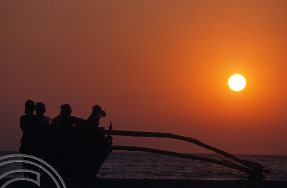T5742. Fishing boat and sunset. Arambol. Goa. India. December 1995