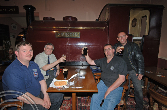 DG03673. A pint in Portmadoc station.  4.6.05.