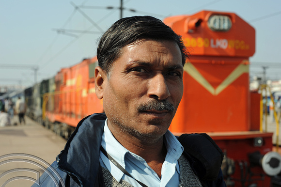 DG70238. Driver and his loco. Lucknow. India. 15.12.10.