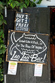 TD08725. Sign on a bar. Luang Prabang. Laos. 5.1.09.