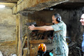 TD25135. Firing a Uzi. France. 14.6.09