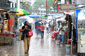 DG439668. Shopping in the rain. Jalan Petaling. Chinatown. Kuala Lumpur. Malaysia. 16.2.2025.