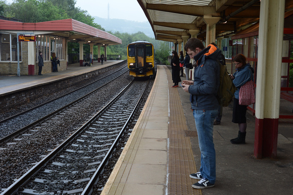 DG180639. 155343 & early morning commuters. Sowerby Bridge. 3.6.14.