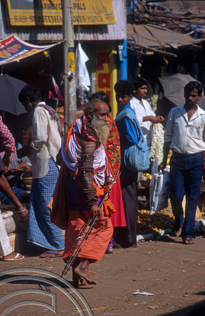 T5697. Sadhu in the market. Mapusa. Goa. India. December 1995